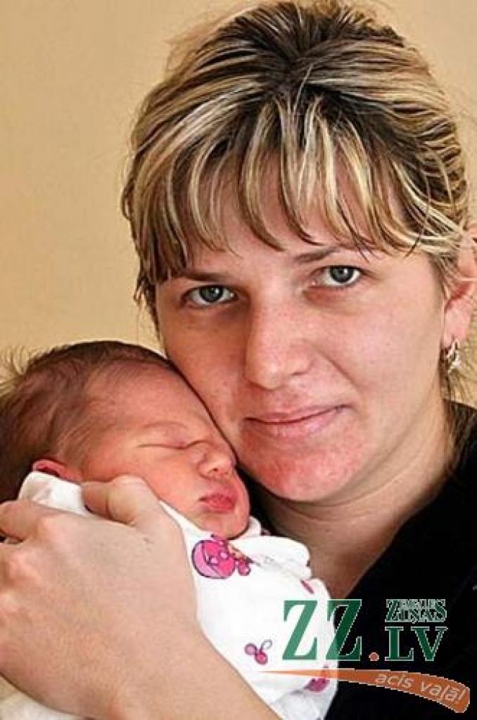 Natālija Tura ar dēliņu Marku.
Autors: Agris Samcovs.