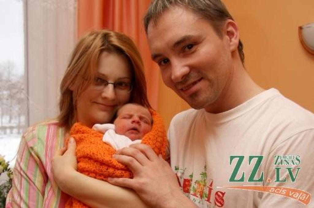 Solveiga un Atis Luguzi ar meitiņu Martu.
Autors: Krišjānis Grantiņš.